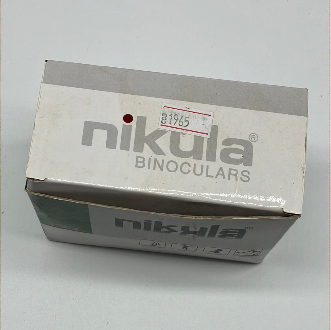 O Binóculo Nikula Alta qualidade com capa de couro.